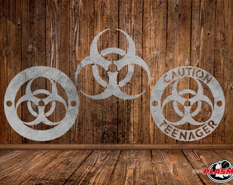 May include: Three metal signs with a biohazard symbol and the text "CAUTION TEENAGER" on a wooden background.