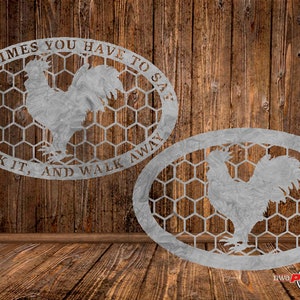 May include: Two metal rooster wall art pieces. Each piece features a rooster silhouette within an oval frame with a honeycomb pattern. The text "SOMETIMES YOU HAVE TO CLUCK IT, AND WALK AWAY" is included.