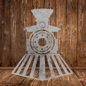 May include: A metal cutout of a train engine with a large wheel in the center. The cutout is painted silver and is set against a wood background.