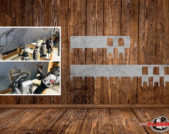 May include: Two metal panels with cutouts for hanging tools. The panels are silver and have a wood grain pattern. The panels are mounted on a wooden wall.