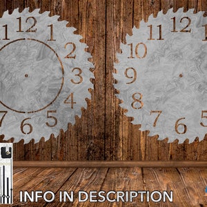 May include: Two grey saw blade clock faces with black numbers 1 through 12 on a wood background. The clock faces are blank and ready to be customised. A set of clock hands is shown below the clock faces.