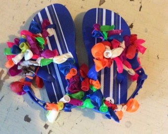 Toddler flip-flops size 7/8 ( medium) with rainbow Balloons and striped pattern on inside