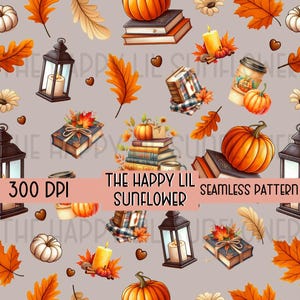 May include: Seamless pattern featuring pumpkins, books, autumn leaves, candles, and lanterns on a gray background. The text "THE HAPPY LIL SUNFLOWER" and "SEAMLESS PATTERN" are displayed. The image has a 300 DPI resolution.