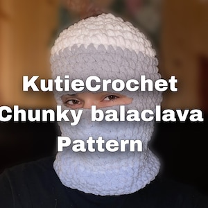 May include: A close-up of a person wearing a gray and white crocheted balaclava. The text "KutieCrochet Chunky balaclava Pattern" is visible in the image.