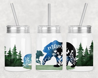 May include: Three white stainless steel tumblers with lids and straws. The tumblers feature a watercolor design of a bear and forest with the word "mama" on one tumbler.
