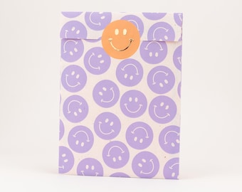 Bolsas de papel con emoticonos, color lila