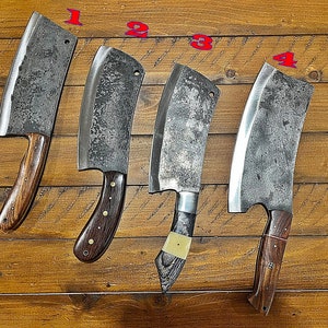 May include: Four large, heavy-duty cleavers with wooden handles. The cleavers are numbered 1 through 4.