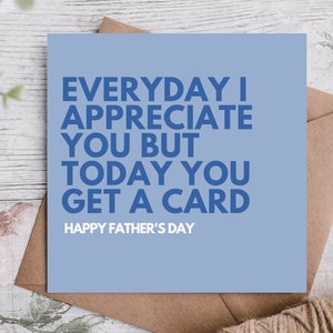 May include: A light blue card with the text "EVERYDAY I APPRECIATE YOU BUT TODAY YOU GET A CARD" in blue lettering. The text "HAPPY FATHER'S DAY" is printed in smaller blue lettering below the main text.