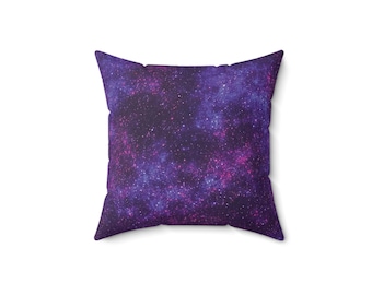 May include: Purple and pink throw pillow with a galaxy print. The pillow is filled with a soft, comfortable material and is perfect for adding a touch of style to any room.