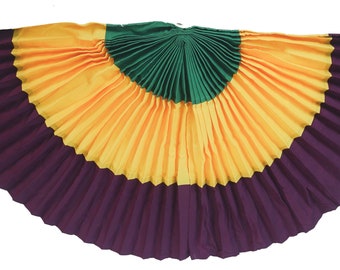 May include: A purple, gold, and green pleated fan. The fan is made of fabric and has a rounded shape.