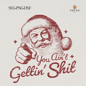 Puede incluir: Una ilustración de estilo vintage de Papá Noel apuntando al espectador con una sonrisa traviesa. El texto "You Ain't Gettin' Shit" está escrito en una fuente en negrita y estilizada debajo de Papá Noel.