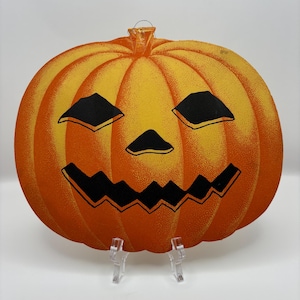 Vintage Halloween 1920s jack- o’- lantern diecut decoration. Dennison