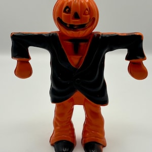 Vintage Halloween 1950s Hard plastic Scarecrow JOL Candy holder. Rosbro