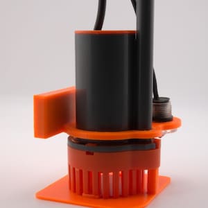 May include: An orange and black submersible pump with a square base and a cylindrical body. The pump has a series of vertical orange fins at the bottom and a black cable extending from the top. The design includes an orange bracket on the side.