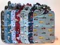 Elasticated lunch napkin for boys: dinosaurs, cars, space, construction sites, knights, football… product logo
