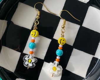 Handmade dangle charm smiley face and flower beaded gold plated brass drop down earrings