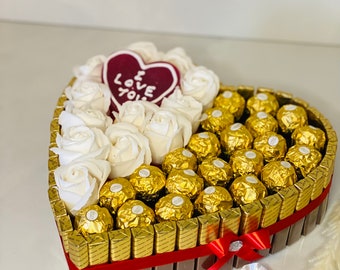 Chocolates heart cake with chocolates whether Mother's Day, wedding anniversary, birthday, engagement, wedding, Valentine's Day or just because