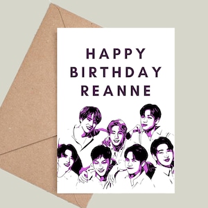 May include: A white card with the text "Happy Birthday Reanne" in purple lettering. A group of seven cartoon figures are shown in purple and black, smiling and posing together.