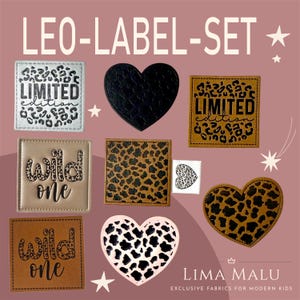 Könnte beinhalten: Ein Set Bügeletiketten mit Leopardenmuster. Die Etiketten umfassen eine Herzform, eine quadratische Form und eine rechteckige Form. Die Etiketten tragen den Text "Limited Edition" und "Wild One".