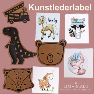 Könnte beinhalten: Ein Set Bügelbilder mit verschiedenen Tiermotiven, darunter ein Bär, ein Fuchs, ein Reh, ein Pferd, ein Waschbär und ein Dinosaurier. Die Patches sind aus Kunstleder und haben eine braune Farbe. Der Text "Kunstlederlabel" ist oben im Bild sichtbar.