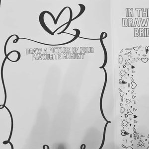 May include: A black and white drawing of a heart with a decorative frame around it. The text "DRAW A PICTURE OF YOUR FAVORITE MOMENT" is written inside the frame. The right side of the image is filled with a pattern of hearts.