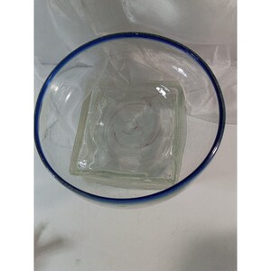 Art Glass Bowl with a blue rim and Hand Blown and a unique Pink Swirl bottom