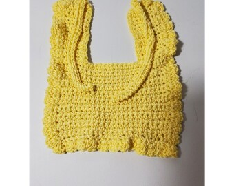 Pretty Yellow Preemie Bib with ties at the neck and ruffle around the bib