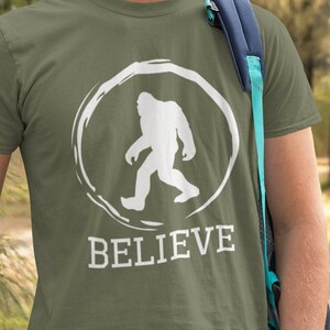 Believe In Bigfoot Unisex T-Shirt - Bigfoot Shirt | I Saw Bigfoot Shirt | I Believe Shirt | Bigfoot Is Real | Conspiracy Shirt | Bigfoot Tee