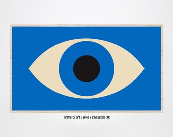 May include: A blue and beige eye graphic with a black pupil. The graphic is framed in a light wood frame.