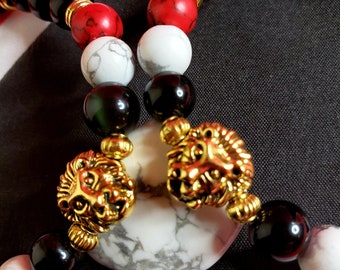 Pulsera de piedras preciosas de Trinidad y Tobago con cabeza de león dorada, perfecta para lucir en el Carnaval del Caribe. Ancho de la cuenta: 8 mm. Varios tamaños.