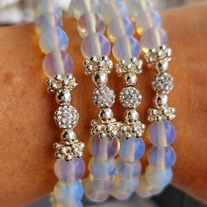 Opalite Healing Gemstone Bracelet with Silver Plated Hematite. Makes a perfect birthday gift. Bead width 8mm and various sizes.