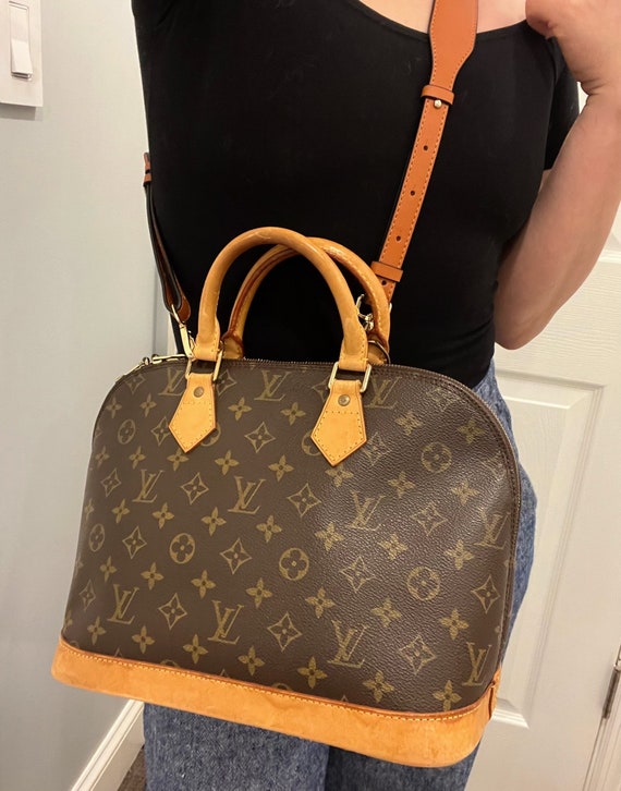 Authentic Louis Vuitton Alma . vitange in a very g
