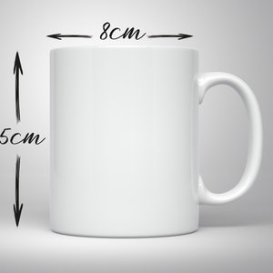 May include: A white ceramic mug with a curved handle. The mug is 3.1 inches wide and 3.7 inches tall. The mug is a plain white color, with no visible designs or patterns. The mug is suitable for hot or cold beverages.