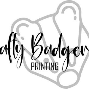 May include: Black and white logo for Crafty Badger Printing. The words "Crafty Badger" are in a cursive font, with "PRINTING" in a block font below. A stylized badger outline is behind the text.