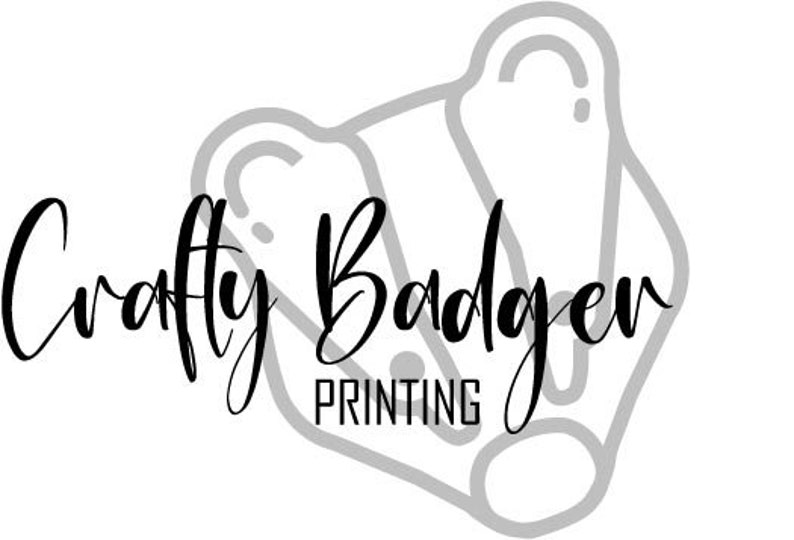 May include: Black and white logo for Crafty Badger Printing. The words "Crafty Badger" are in a cursive font, with "PRINTING" in a block font below. A stylized badger outline is behind the text.