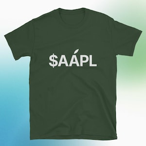 May include: Dark green t-shirt with the white text "$AAPL". The design includes a dollar sign, the letters AAPL, and a stylized apple logo. The shirt is made of a soft material.