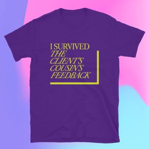 May include: A purple t-shirt with the text "I Survived The Client's Cousin's Feedback" in yellow. The text is enclosed in a yellow rectangular border. The shirt is displayed on a gradient background of pink, blue, and purple.