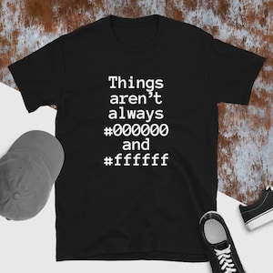 Puede incluir: Camiseta negra con texto blanco que dice "Things aren't always #000000 and #ffffff".