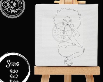 May include: Black and white line art drawing of a woman with an afro hairstyle, wearing a swimsuit, sitting with her legs crossed. The drawing is on a white canvas.