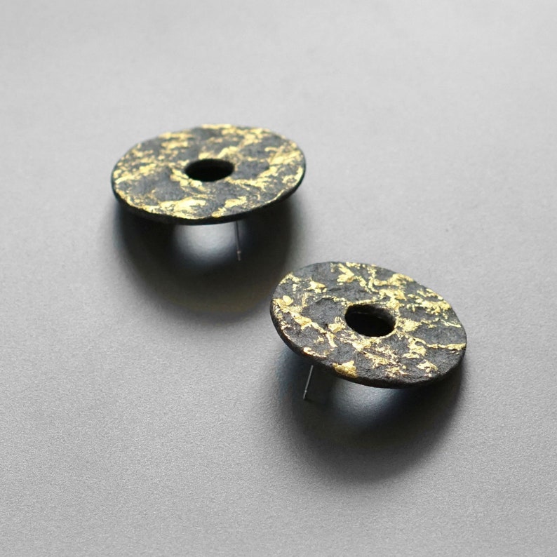 The Jumbo Black Hoop Earrings in Gold (Clip) main image 1