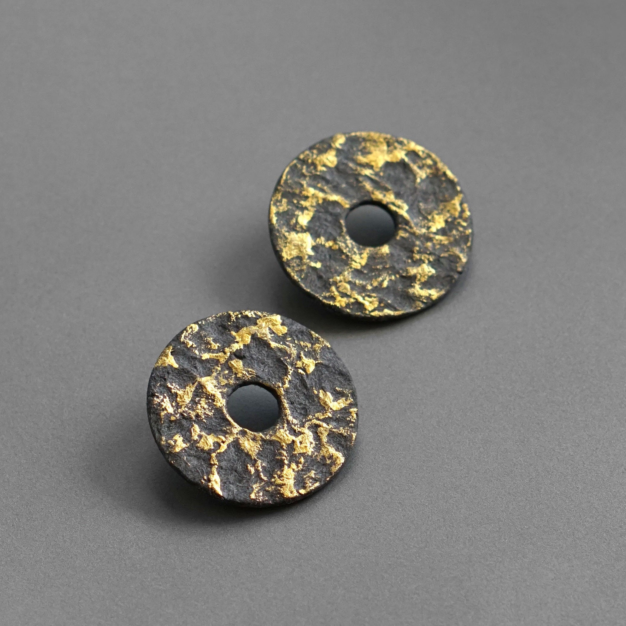 The Jumbo Black Hoop Earrings in Gold (Clip) main image 0