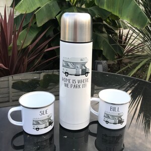 750ml thermos flask featuring graphic of motorhome with wording below 'Home is where we park it'. Also with 2 matching cups personalised with name.