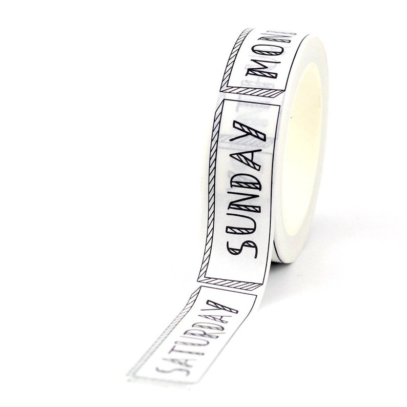 May include: White washi tape with black text that reads "Saturday", "Sunday", and "Monday".