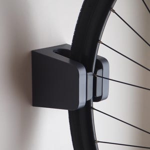 Compact Bike Wall Mount with auto-lock feature