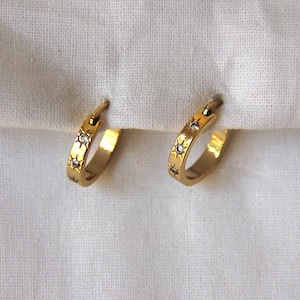 Starburst huggie earrings
