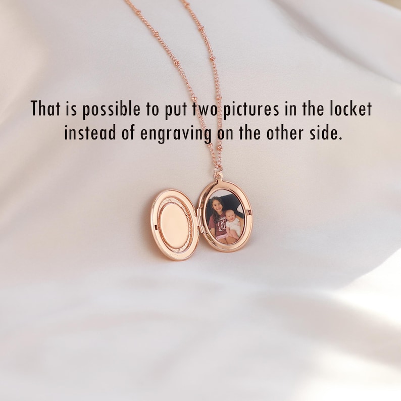 May include: A rose gold locket necklace with a photo of a woman and a child inside. The locket is open, revealing the photo.