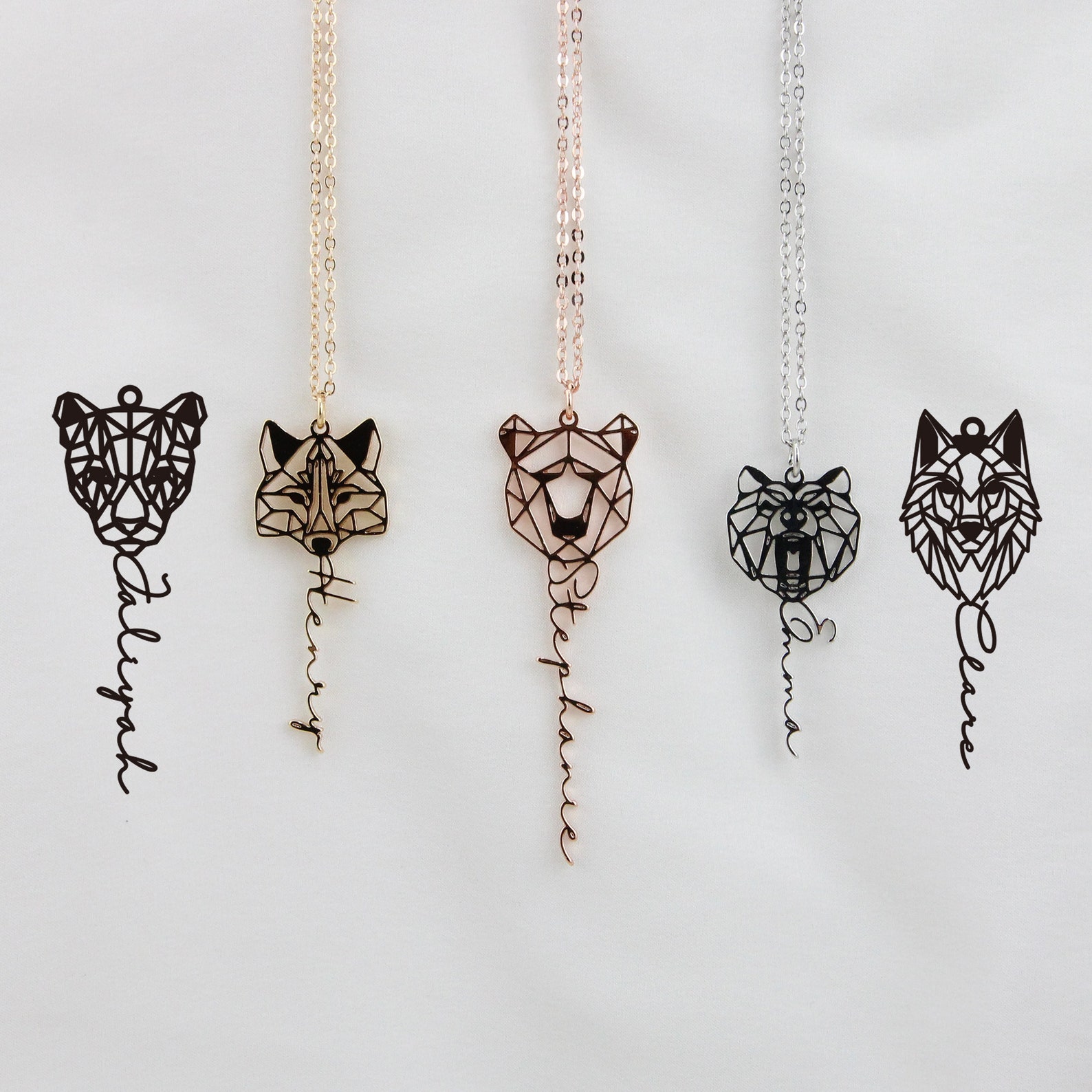 five handmade wolf necklaces