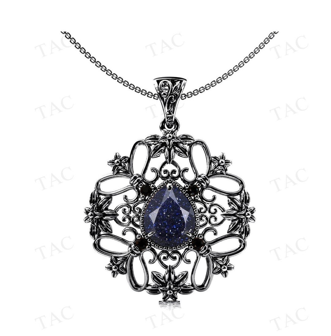 PUNK CARVED BLUE SANDSTONE PENDANT