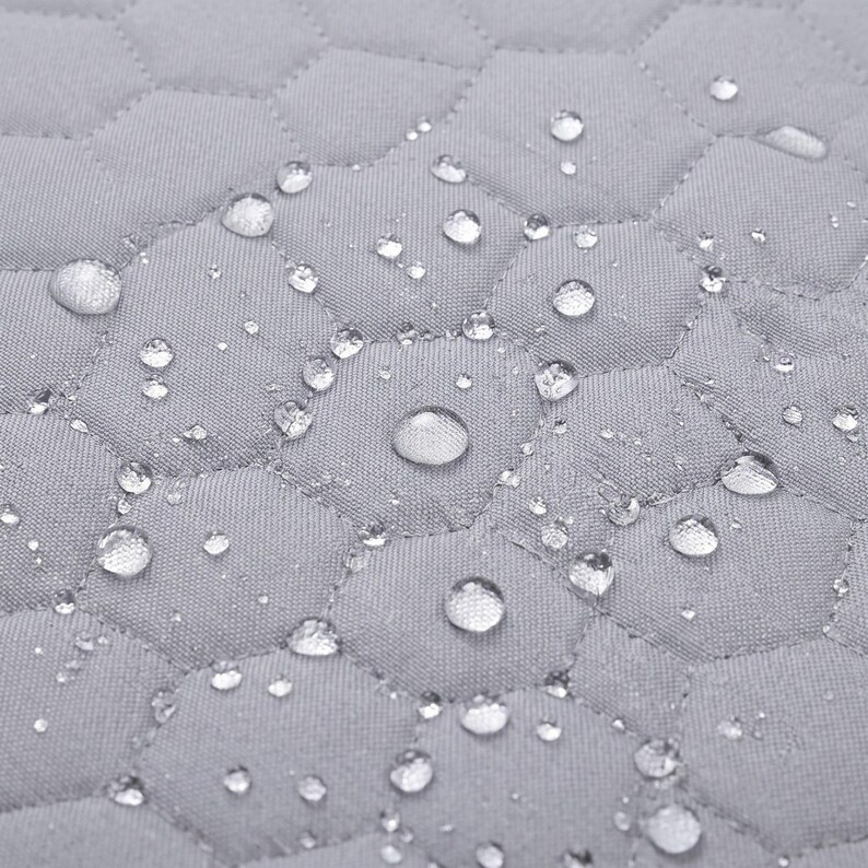 Waterproof twin swing in light grey, double seat with safety belts - close-up of the seat detail