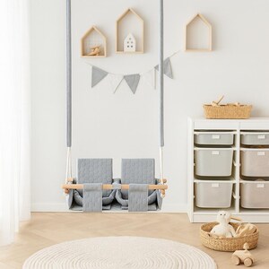 Waterproof twin swing in light grey, double seat with safety belts - side view of the seat